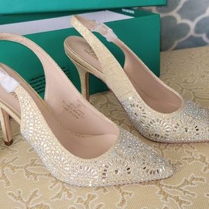 Gold tone  rhinestone slingbacks.